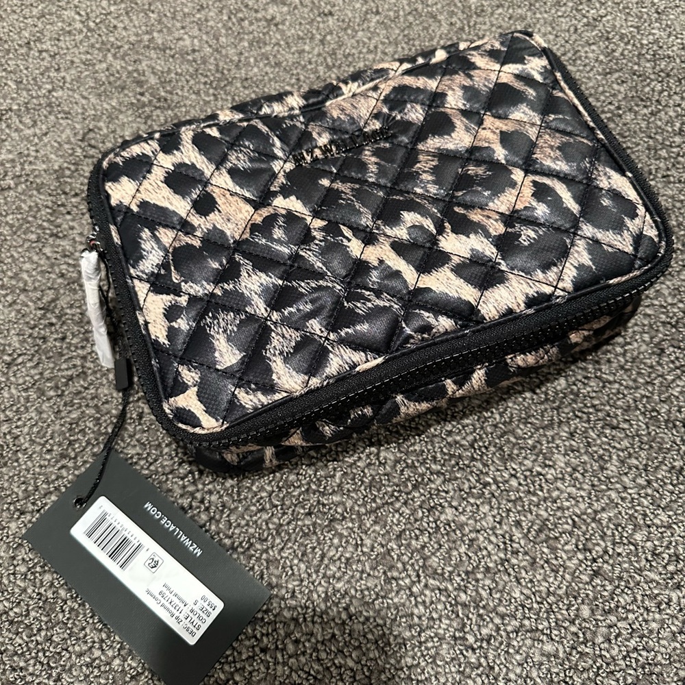 Mz Wallace Zip around cosmetic in animal print